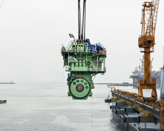 Illustration for article titled Pictures of the World's Biggest Cargo Ship Make You Feel Tiny